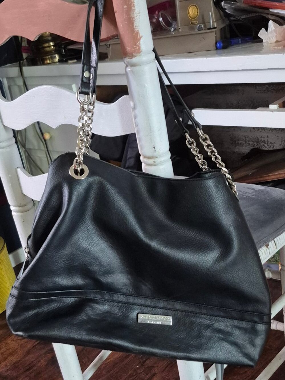 Bag by Jones of NY. Black, lots of room.PVC